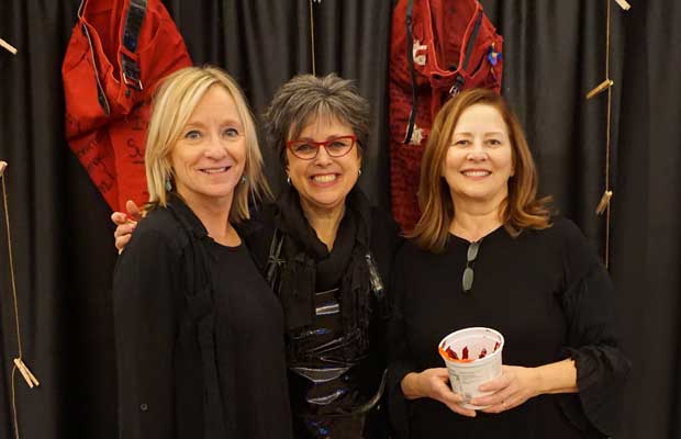 Artists Susan Anderson, Pamela Alderman, and Anna Donahue at Red Jeans Redemption live painting event