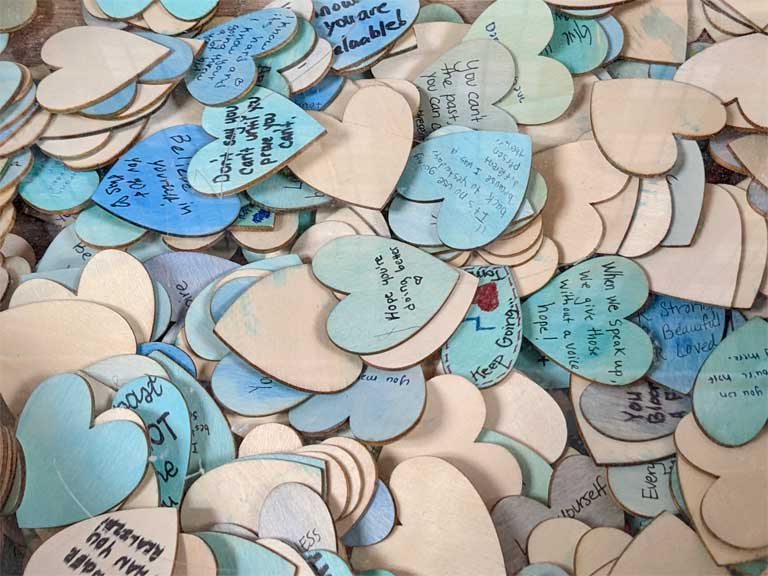 Healing messages on wooden hearts